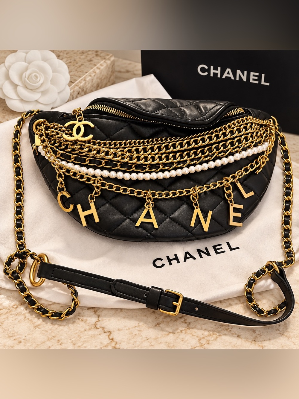 CHANEL Black Quilted Leather Crossbody with Gold Chains, Pearl & Letter Charms